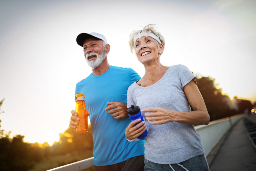 Older couple going for a run outside