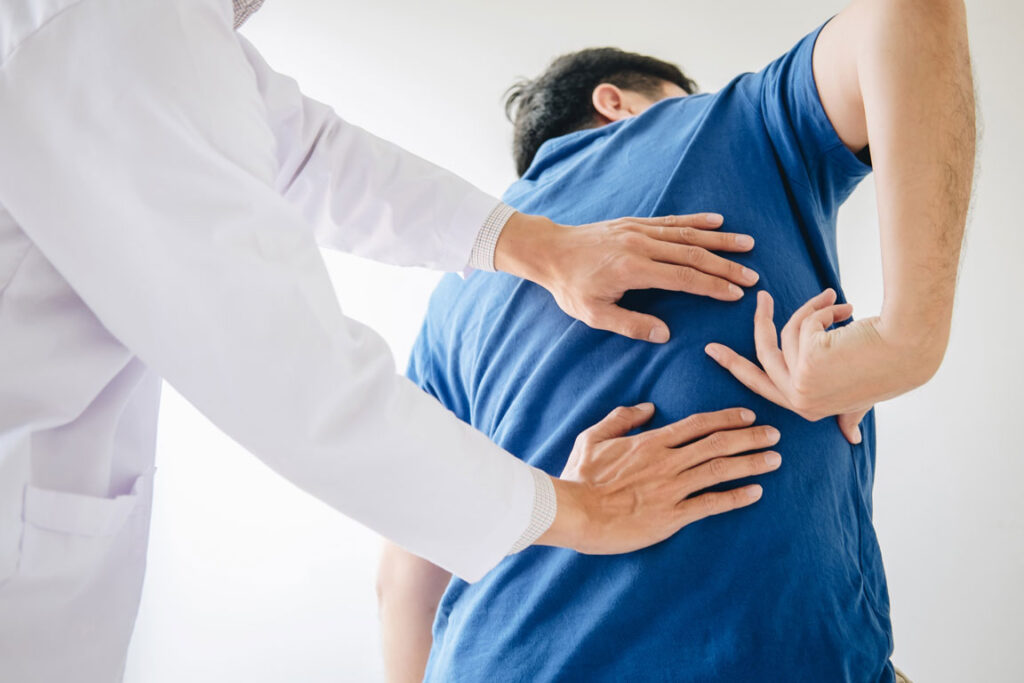 chiropractor treating lower back pain