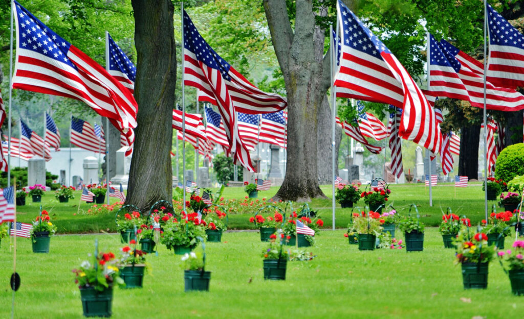 American flags and flowers honoring Memorial Day