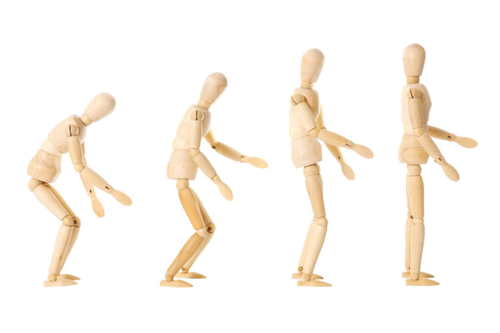wooden dolls representing posture