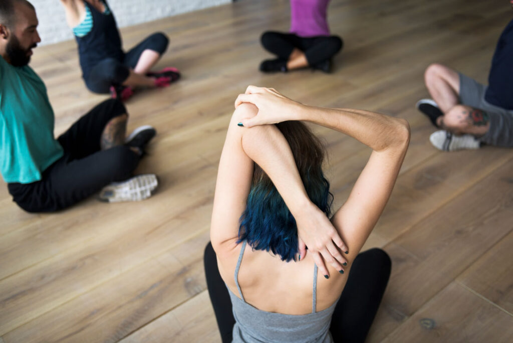 back stretches during a Yoga class
