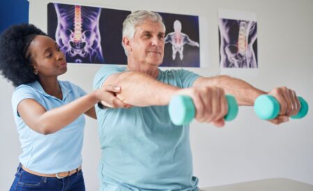Patient using dumbells