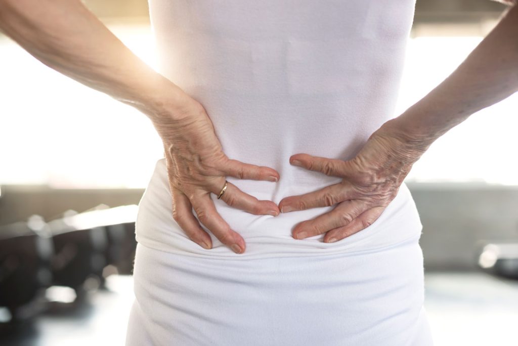 sport-injury-senior-woman-suffering-from-backache lower back pain